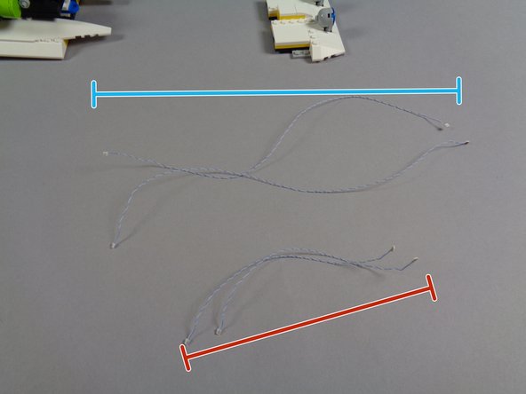 As shown by the two lines in the third photo, the lights in the &quot;Blue Roof Lights&quot; bag have two different lengths of wire.  In the photo, the red line shows the shorter wires while the blue line shows the longer wires.