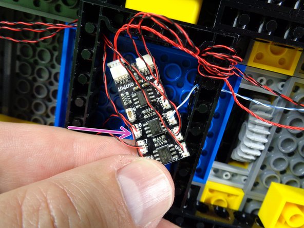 As shown by the purple arrow in the third photo, connect the tail light to plug #8 on the BRANCH09X adapter.