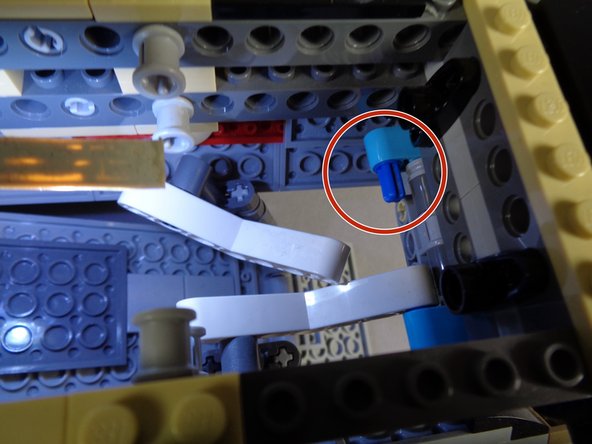 Next you will prepare the two arms that raise and lower the boarding ramp for modification.