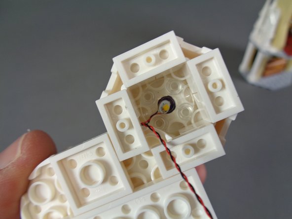 When attaching the &quot;boat stud,&quot; make sure the LED light wires run between, not on top of, any studs.