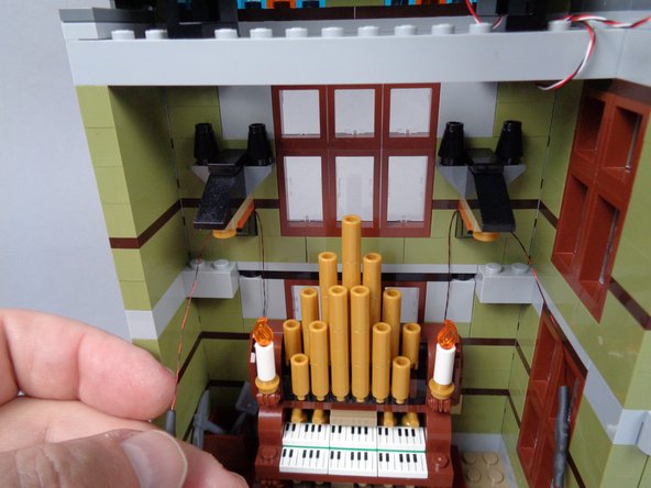 As shown in the photos for this step, repeat this same process for the second candle.