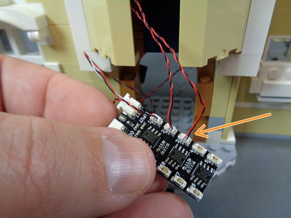 If you chose not to complete the disassembly of the front of the castle, you will pull the light wire down directly into the kitchen.