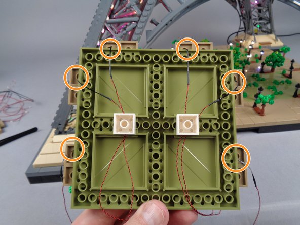 Note that the wires are passing toward the front of the panel, which is at the bottom of the photo.