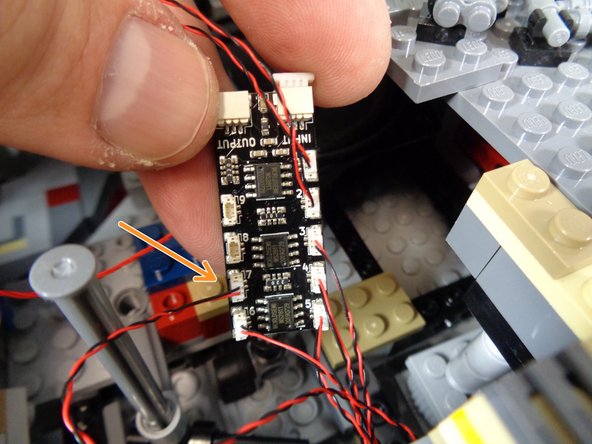 As shown by the orange arrow in the third photo, connect the cockpit light to plug #7 on the second BRANCH09X adapter board.