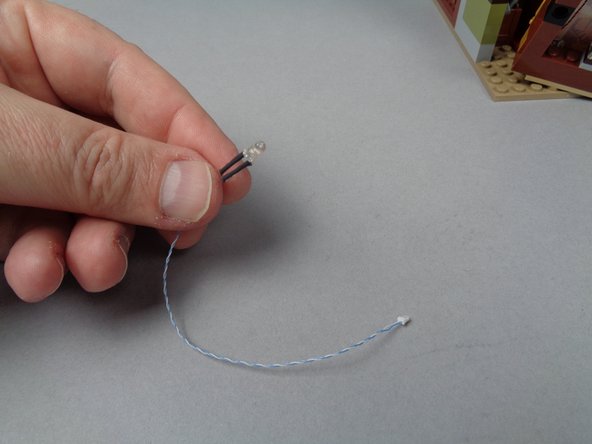 The first photo for this step shows the second rooftop lighting LED light, which is included in your BOX #3.