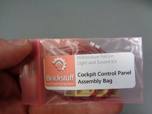 Remove the parts as shown in the second photo.