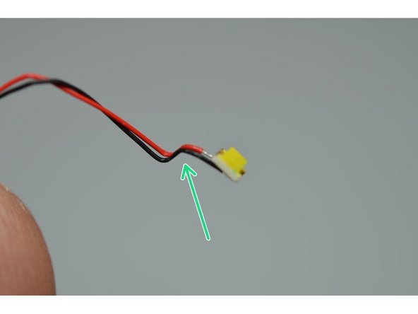 You can prepare the LED wires by placing each LED on top of a LEGO® stud and then bending the wires over the edge of the stud using your fingernail.