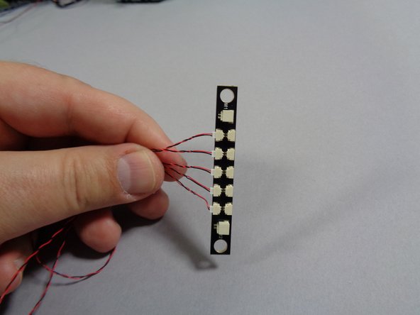 Inside the &quot;Central Power Parts&quot; bag, there will be a large adapter board with 10 small plugs as shown in the first photo.  Connect the five lanterns to any five small plugs on the adapter board.