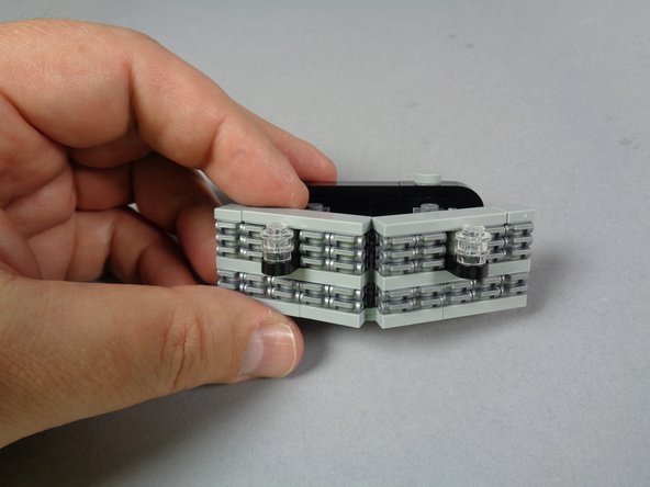 Now you will disassemble the front grille to remove the two front strobe lights.