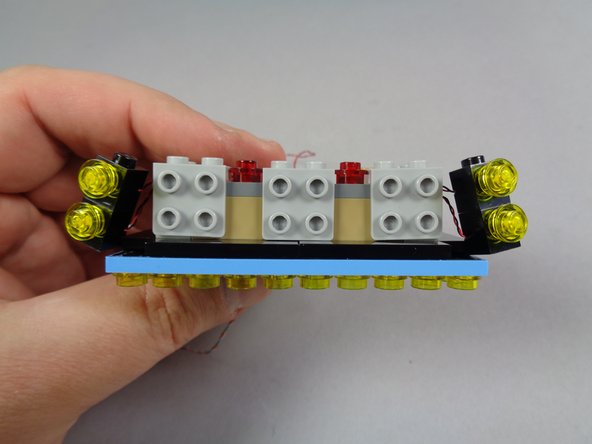 Make sure the light wires pass between, not on top of, any studs.