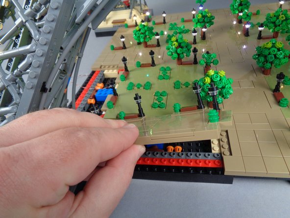 As shown in the three photos for this step, remove Panel 3F.