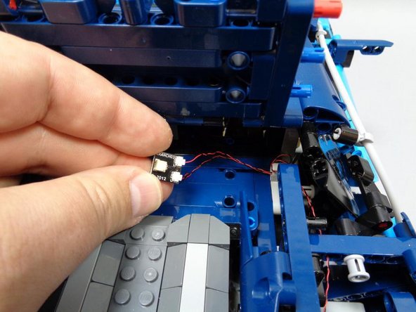 As shown in the third photo, use another BRANCH03 adapter board from Bag 1 to connect both the front and rear right turn signal wires.