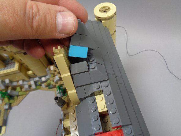 You will now prepare to install the pre-lit stained glass window assembly included in Bag 10.