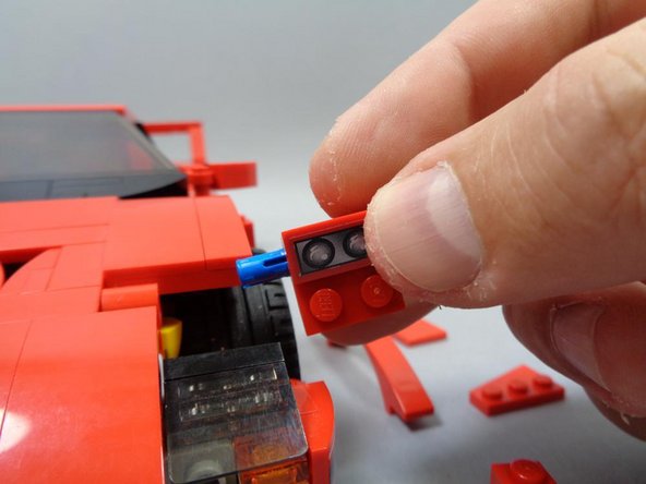 Repeat Steps 4-11 for the right side of the car to mount the other set of headlights.