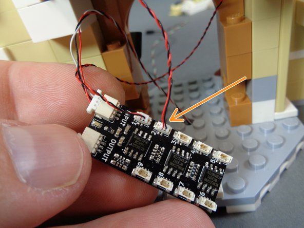 If you chose not to complete the disassembly of the front of the castle, you will pull the light wire down directly into the kitchen.