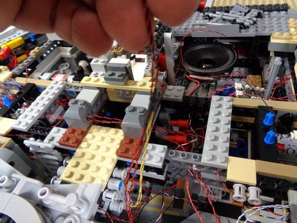 As shown in the third photo, connect the two laser cannon light wires to plugs #8 and #9 on the second BRANCH09X adapter board.