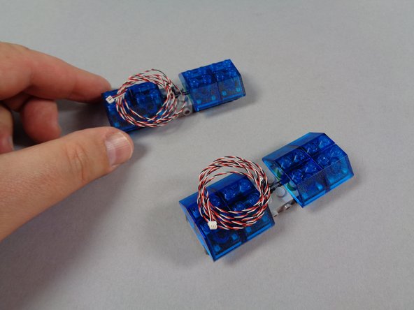 Take the lightbars out of their pink bags.