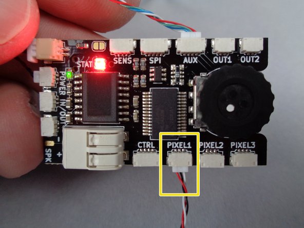 Also inside the bag, there will be a short 3-wire connecting cable, as shown by the orange arrow in the first photo for this step.