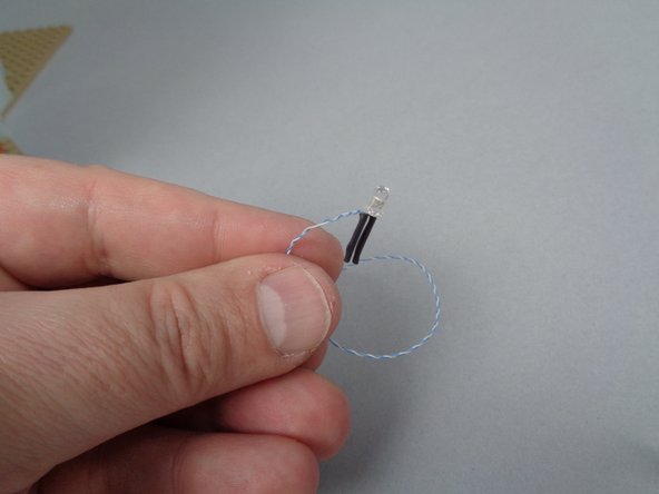 As shown in the first photo for this step, remove the top pyramid-shaped roof piece from the roof section you removed at the beginning of the installation process.