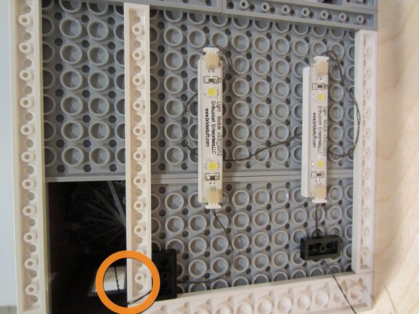 The first photo in this step shows a feeder wire from an upper floor passing through a balcony opening.