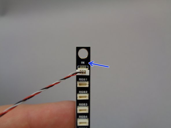 Inside Bag 11, there should be a special cable approximately 36&quot; in length.  As shown in the first photo, this cable has a small connector on one end (red arrow) and a larger connector on the other end (blue arrow).  Both connectors have three wires.