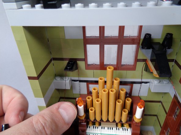 As shown in the photos for this step, repeat this same process for the second candle.