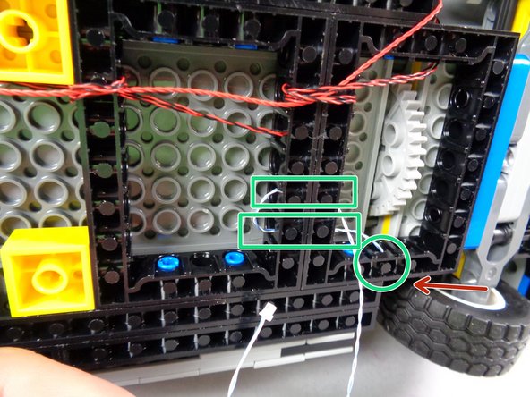 As shown in the first photo for this step, find the blue/white wire connected to the hood spot light that you installed earlier.