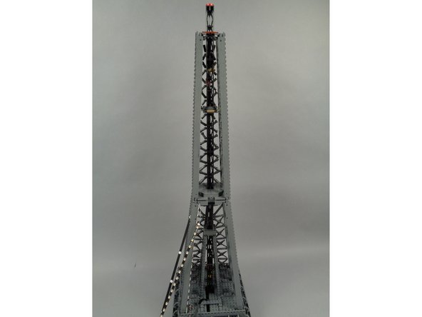 The rear section of your Eiffel Tower top should now be fully open, as shown in the photo for this step.