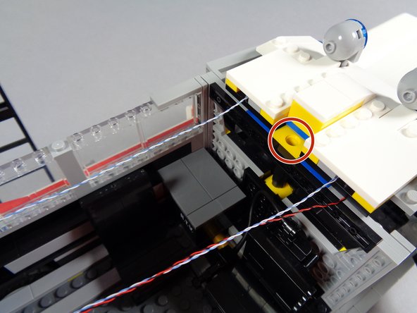 Next you will route the three light wires from the front roof section back toward the BRANCH09X adapter in the rear.