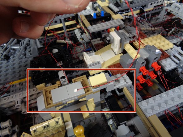 As shown by the red rectangle in the first photo, re-attach the frame next to the interior door and the top door frame itself.