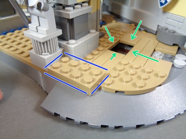 As shown by the green arrows in the third step, this should leave a gap in the castle floor the same size as a 2x3 plate or tile.