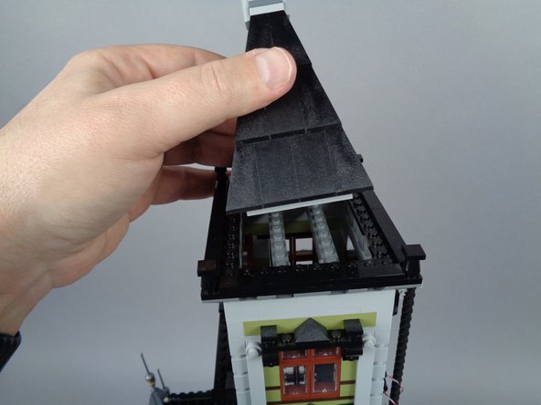 One large magnet, shown by the red arrow (your magnet may differ in appearance or color from the magnet shown in the photo)