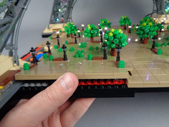 As shown in the three photos for this step, remove Panel 3F.