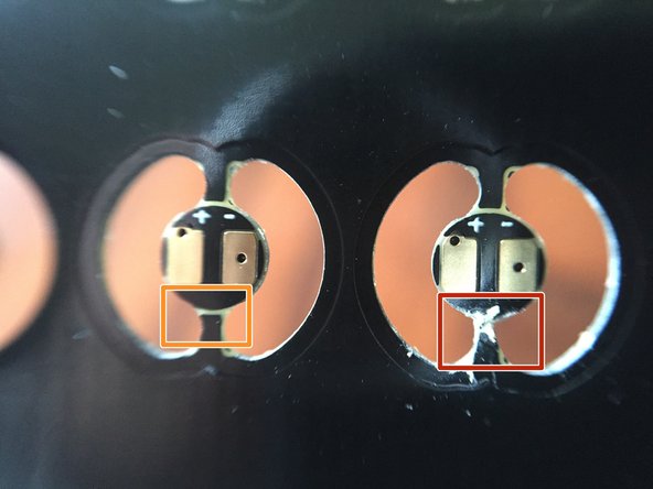 The orange and red boxes in the second photo show an uncut finger (orange box) and a cut finger (red box).