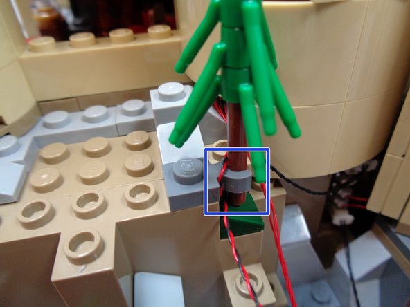 Do not wrap the red control wire in the clip.  You will finish running that wire in the next step.