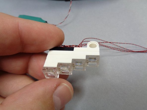 As shown in the second photo, each section of the headlight assembly has large LEDs (with black circular backgrounds) but also smaller LEDs in the corners of each panel (see red arrows in photo 2).