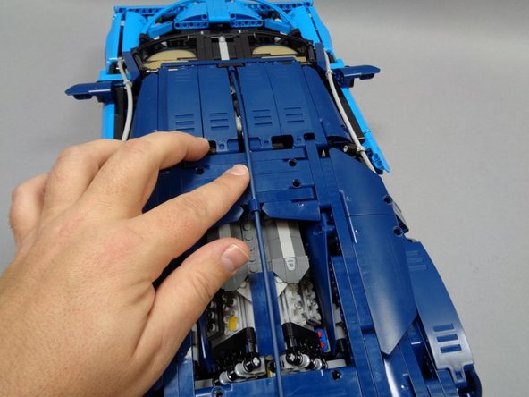 As shown in the second photo, carefully re-attack the long blue tube.