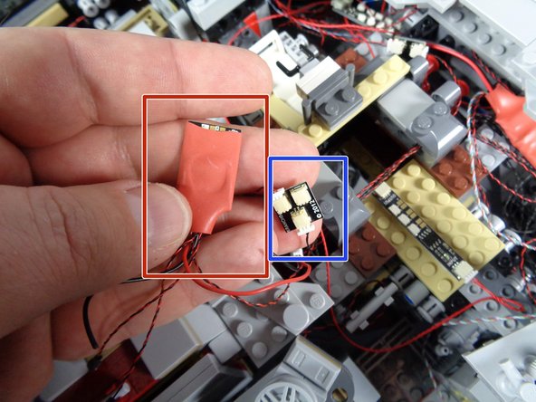 Your old kit had a small lighting effect module dedicated to controlling the top laser cannon.  In your upgrade kit, the BRANCH09 adapter board controls these functions, so you no longer need the old effect controller.