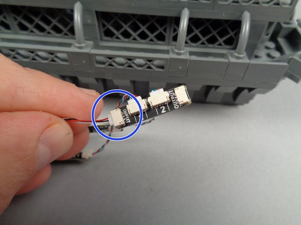 Select another light strip pair and adapter board, and connect the other end of the control cable to the INPUT plug on the next adapter board.