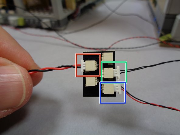 There should also be a 2-wire 6&quot; connecting cable in Bag 1.  Connect one end of that cable to one of the plugs on the BRANCH18 adapter board (it doesn't matter which plug you connect the cable to).  See the first photo.
