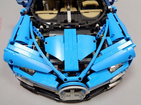 As shown in the third photo, you should now be able to close the hood, and all wires should be concealed inside the hood.