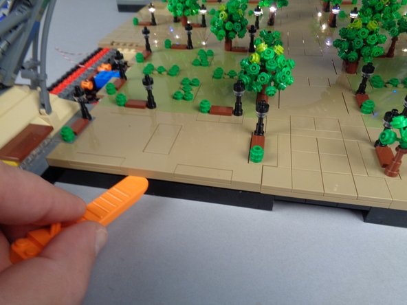 As shown in the three photos for this step, remove Panel 3F.