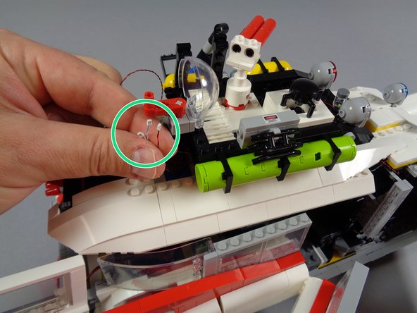 Now you will re-attach the rear roof section to the main body of the Ecto-1.