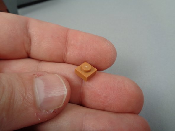 The LEGO part for this step is taken from the extra parts provided in your original LEGO set.  It is not included with your light kit.