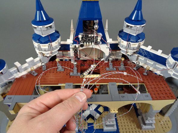 After you have mounted the five color-changing spotlights, you can connect the five wires from the spotlights to the five small plugs on the BRANCH17 adapter board as shown in the second photo.