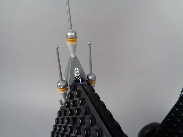 The second photo for this step shows how your roof with lighting LED light should look after re-assembly.