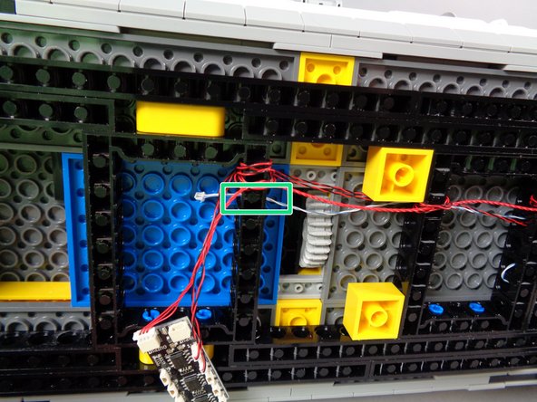 As shown in the second photo, the wire will just barely reach into the area of the BRANCH09X adapter; you may need to adjust how you feed the wire through the frames if your wire is too short, or if it is shorter than the wire in the second photo.