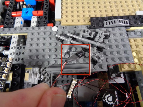 As shown by the red square in the third photo, remove the old infrared receiver from the Falcon.