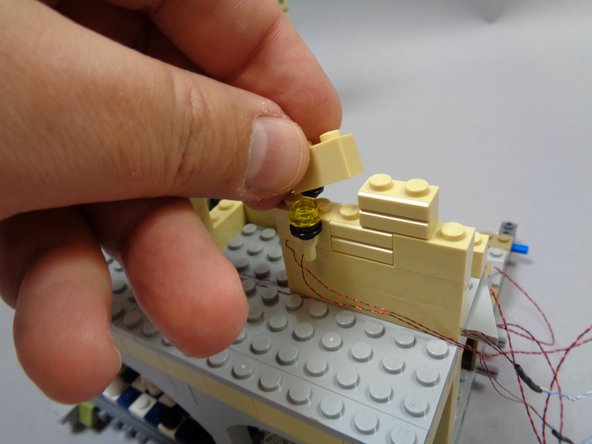 After you have verified that all lights are operational, you can begin re-assembling the castle sections as shown.