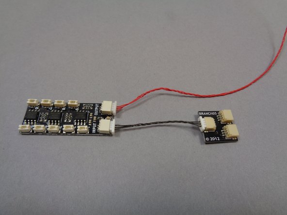 One BRANCH09X adapter board (blue arrow in the third photo).